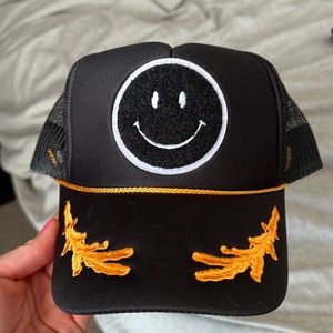 Captain Smiley Face trucker hat
